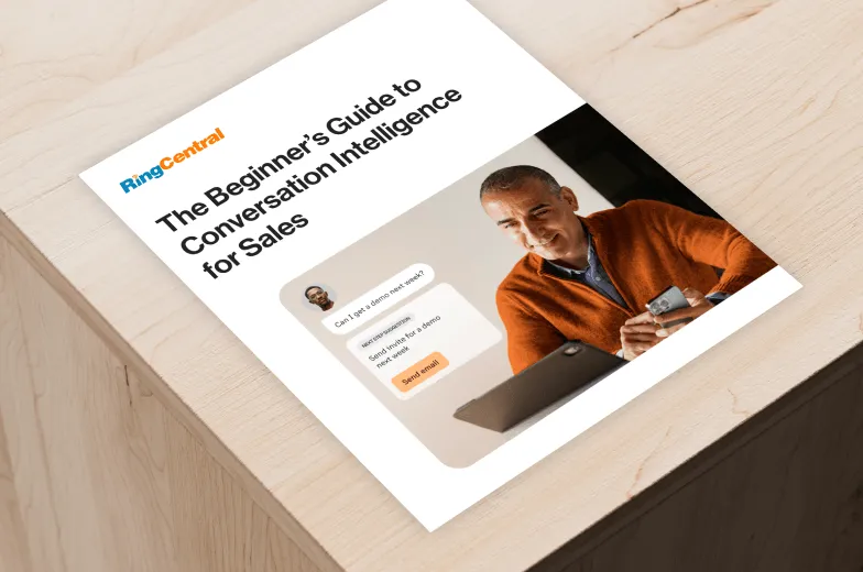 Whitepaper cover: A man using Conversation Intelligence to talk to a client